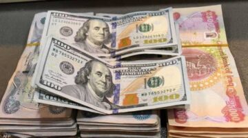 سعر 100 دولار في العراق